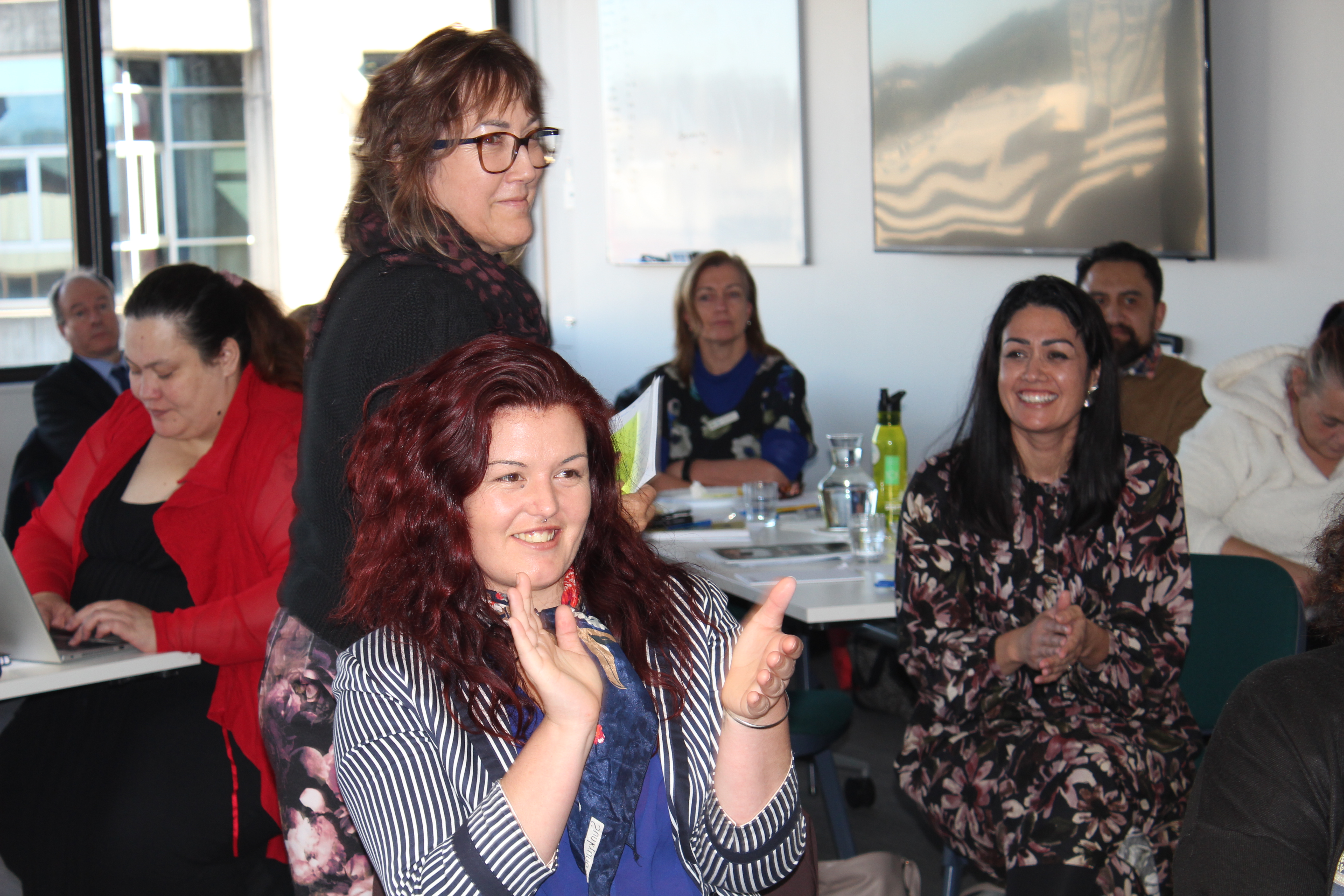Group photo clapping, learner journey workshop