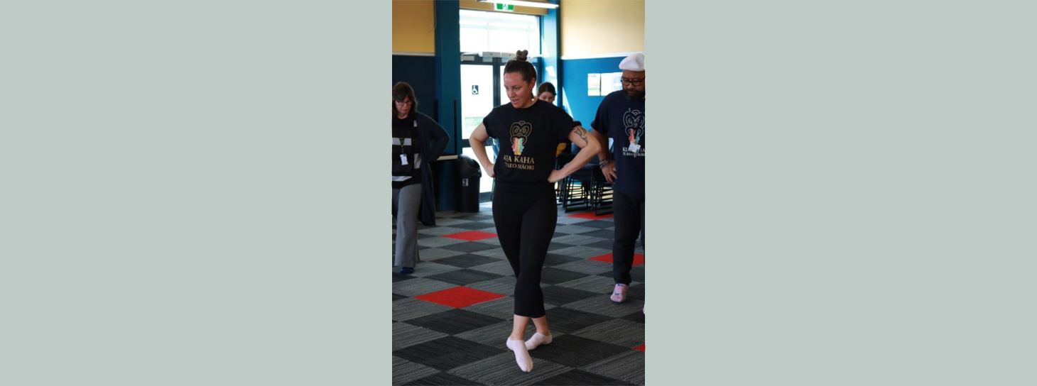 Woman participating in Māori movement class